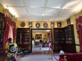 Room with several womens’ portraits